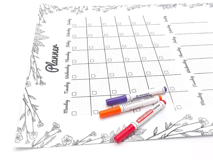 Dry-erase planner board 477 - Graphic design with a simple grid layout, days of the week, and floral motifs.