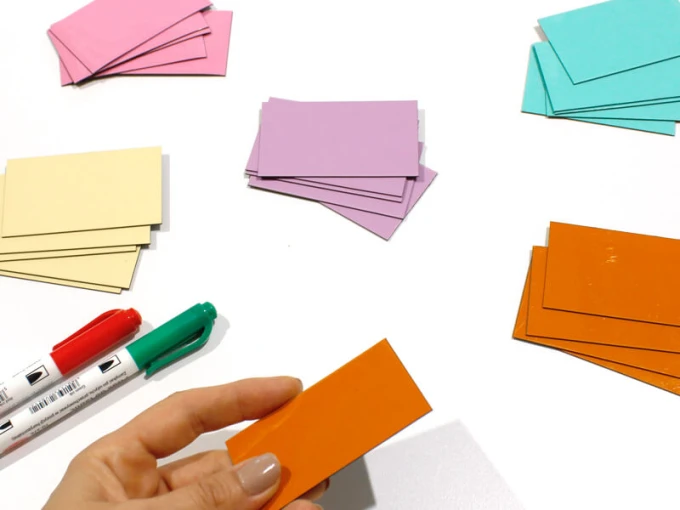 Custom dry-erase magnets in small sizes - Graphic design. Rectangular sheets in various colors on a white background.