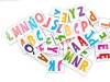 Magnetic letters set of 100 - graphic design. Letters in various colors and shapes on a white background.