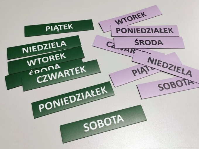 Custom magnetic mat in small size - Graphic design with simple green and pink rectangles and white accents.