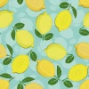 Lemon wallpaper on a blue background - graphic pattern with yellow lemons and green leaves.