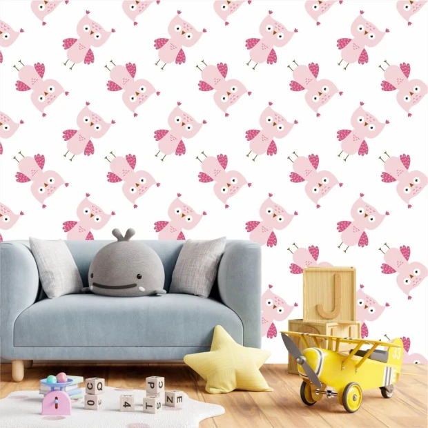 Pink owl wallpaper for girls\' room - Decorated in a bright children\'s space with light-colored walls and furniture.