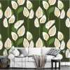 Calla 0250 wallpaper - Living room setup with dark walls, light sofa, and geometric patterned cushions.