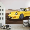 Yellow classic sports car wallpaper 0354 - Room decor with a house and toy car. Light-colored walls.