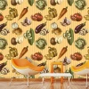 Wallpaper for dining room and kitchen, featuring a colorful vegetable design. Modern interior with light-colored walls.