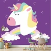 Unicorn wallpaper for girls\' room, rainbow design - Styled in a purple children\'s room with furniture.