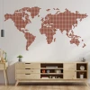 Stylish world map sticker in shades of red, perfect for a modern living room, adds character.