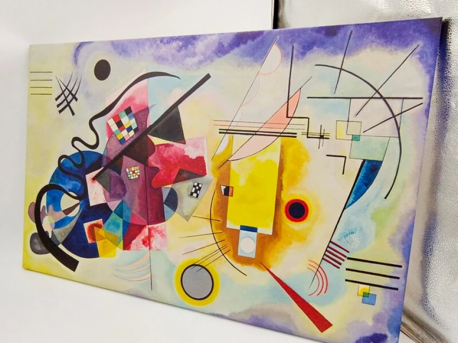 Reproduction of Yellow-Red-Blue by Wassily Kandinsky - Abstract graphic pattern in yellow, red, blue, and black.