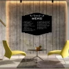 Magnetic chalkboard Menu 124 in a modern living room with gray walls and wooden panels, accented by yellow.