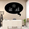 Chalkboard magnetic board for office use, featuring light-colored walls and modern furniture.