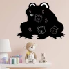Chalkboard magnetic board for kids\' room, Frog 264 - Decorated with light-colored walls and furniture.