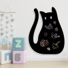 Magnetic chalkboard Cat 273 - Decorated children\'s room with light-colored walls and playful elements.