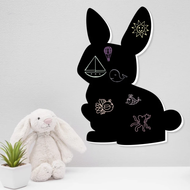 Chalkboard magnetic board for kids\' room featuring a bunny with drawings of the sun, balloon, bird, and fish.
