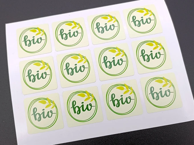 Custom printed self-adhesive label - Graphic design. Round labels with "bio" text and leaf motifs.