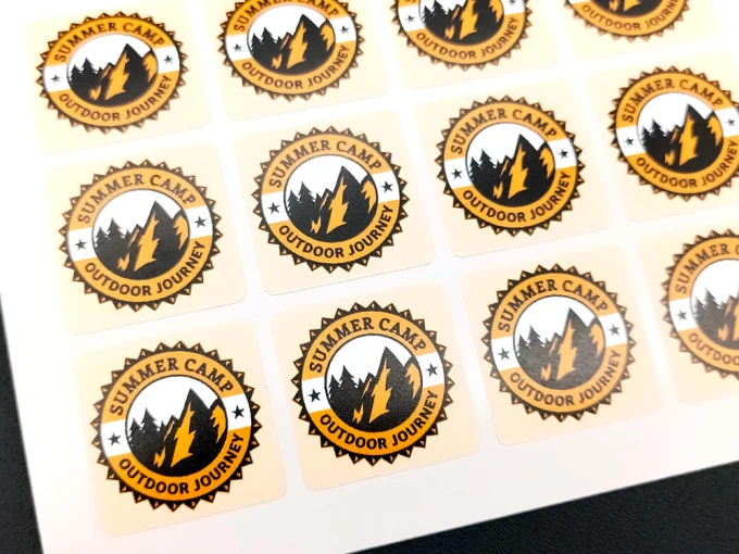Custom printed self-adhesive label - Graphic design. Round labels featuring mountains and lightning.