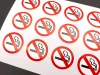 Custom printed adhesive label - Graphic design. Round stickers with a no smoking symbol.