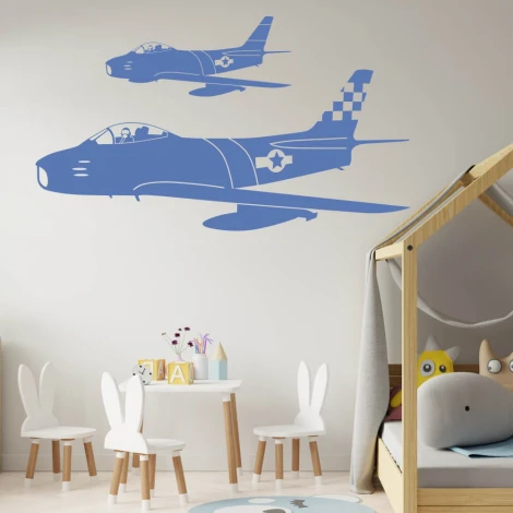 Stylish airplane stickers in pastel colors, perfect for a child\'s room, adding a cheerful touch.