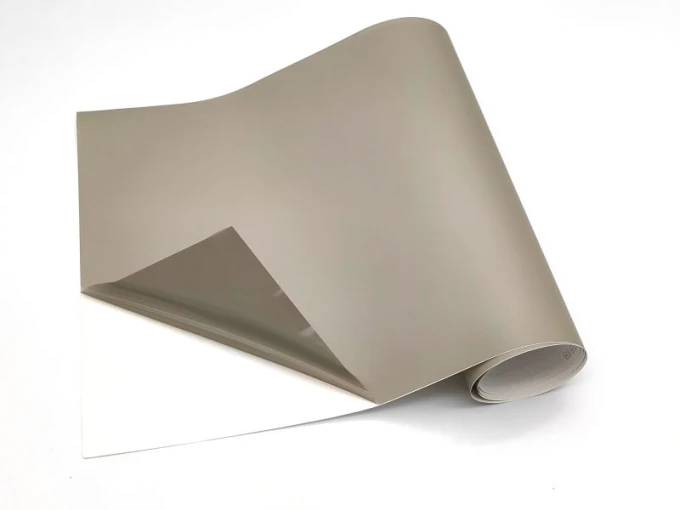 Self-adhesive protective film - Graphic pattern. Gray film with a white backing.