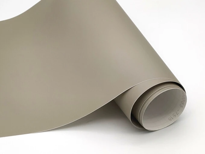 Self-adhesive protective film - Graphic design. Smooth, matte surface in beige shade.