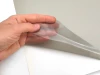 Self-adhesive protective film - Graphic design. Transparent film with a subtle sheen.