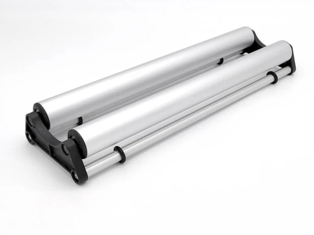 Advertising media roller - Graphic design. Two silver cylindrical elements on a white background.