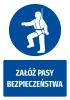 Safety sticker with seatbelt icon - Round graphic design featuring a figure in a harness. Text included.