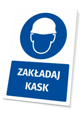 Safety sign with helmet icon - round graphic featuring a head in a helmet and text below.