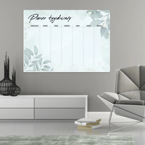 Magnetic dry-erase weekly planner board - styled in a modern living room with light-colored walls.