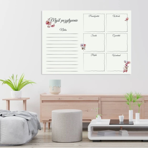 Magnetic dry-erase weekly planner board with floral design for modern interior decor. Bright wall colors.