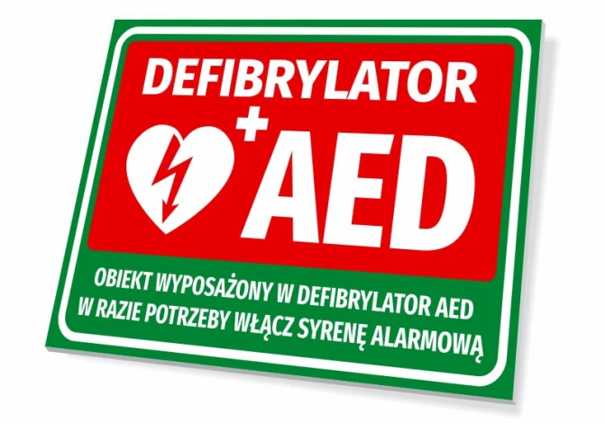 AED Defibrillator Information Sign - Graphic design with red background, white text, and heart symbol with lightning bolt.