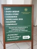 Chalkboard A-frame with custom print - Graphic design. Green board with white text and icons.