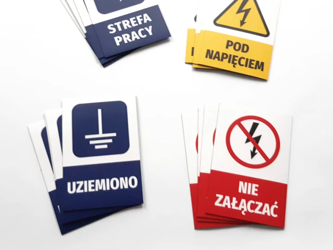 Set of 19 magnets with graphic designs featuring warning and informational symbols.