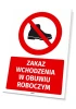 Safety sign: No entry with work shoes - Graphic design. Red circle with a crossed-out black boot on a white background.
