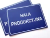 Production Hall Sign - Graphic design. Simple rectangular shape with white text on a blue background.