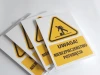 Safety warning sign with a caution! Slip hazard pictogram - graphic design. Yellow triangle with black.