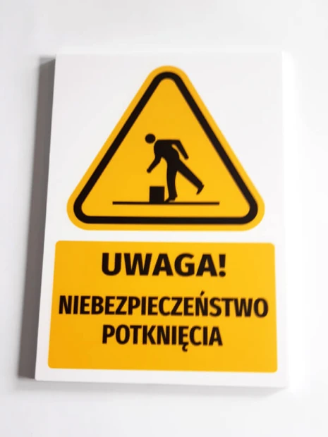 Warning safety sign with a "Caution! Slippery surface" pictogram. Features a triangular shape.