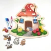 Magnetic dry-erase board shaped like a mushroom house with a red design.