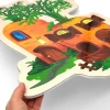 Magnetic dry-erase board shaped like a carrot house with a window and door design.