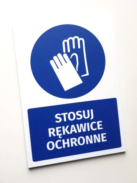 Safety sign with icon: Use protective gloves - Round blue symbol with white gloves.
