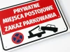 Private parking spaces sign, no parking - Graphic design. Red background, white text, towing icon.