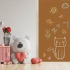 Custom chalkboard door sticker - Ideal for a child\'s room with warm brown walls, a plush bear, and flowers.