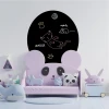Round chalkboard for kids\' room decor. Light-colored walls and animal-shaped furniture.