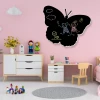 Chalkboard 003 butterfly - Decor in a children\'s room with pink walls and light-colored furniture.