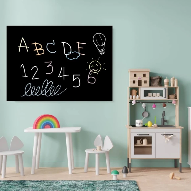Custom chalkboard - Ideal for a child\'s room with light-colored walls and natural wood furniture.