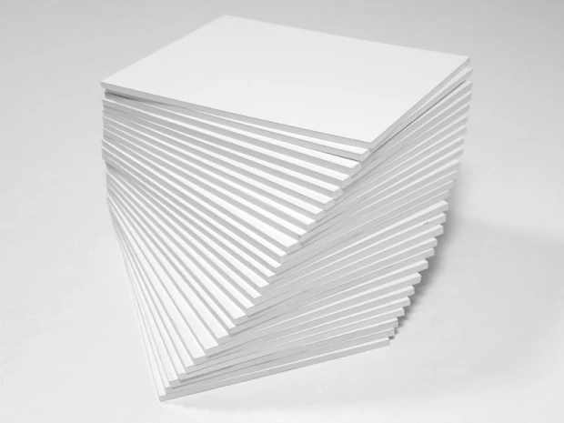 2mm white PVC sheet cut to size - Graphic pattern. Stacked rectangular sheets visible.