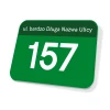 Street name and house number sign - Rectangular green plaque with white lettering.