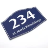 Rectangular house plaque with rounded corners, dark blue, featuring number and address - graphic design.