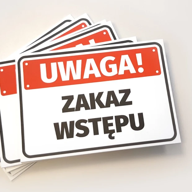 Warning: No Entry Sign - Rectangular sign with a red background and white text.