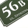Address plaque with house number - Rectangular design with white digits and text on a green background.