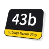 House number and street sign Katowice - Rectangular plaque with black background, white number, and yellow accents.